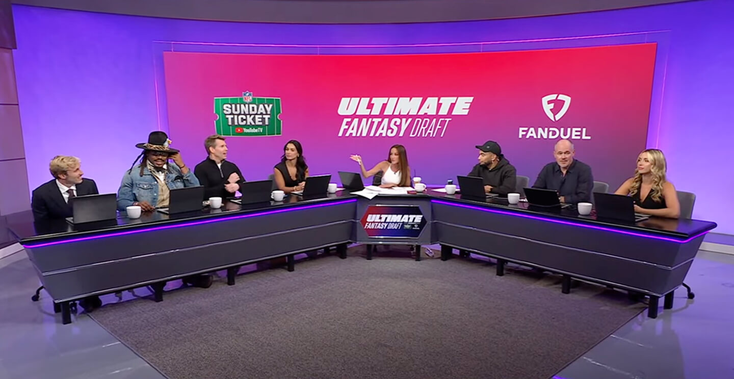 Broadcast studio set with hosts at the desk for the NFL Ultimate Fantasy Draft show