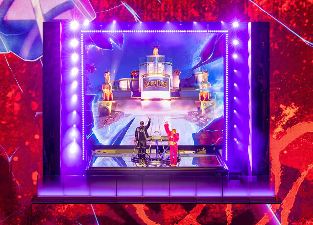 Neon LED stage set with two performers and a Snoop Dogg riverboat backdrop, Fortnite Remix launch