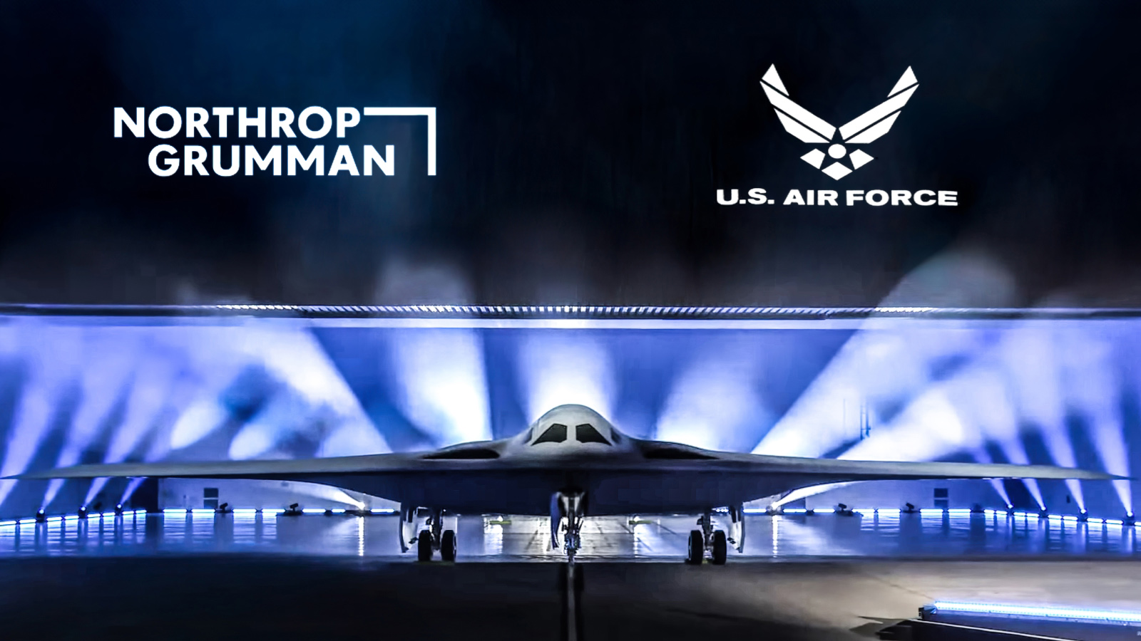 Northrop Grumman B-21 stealth bomber unveiled under blue lights for the U.S. Air Force