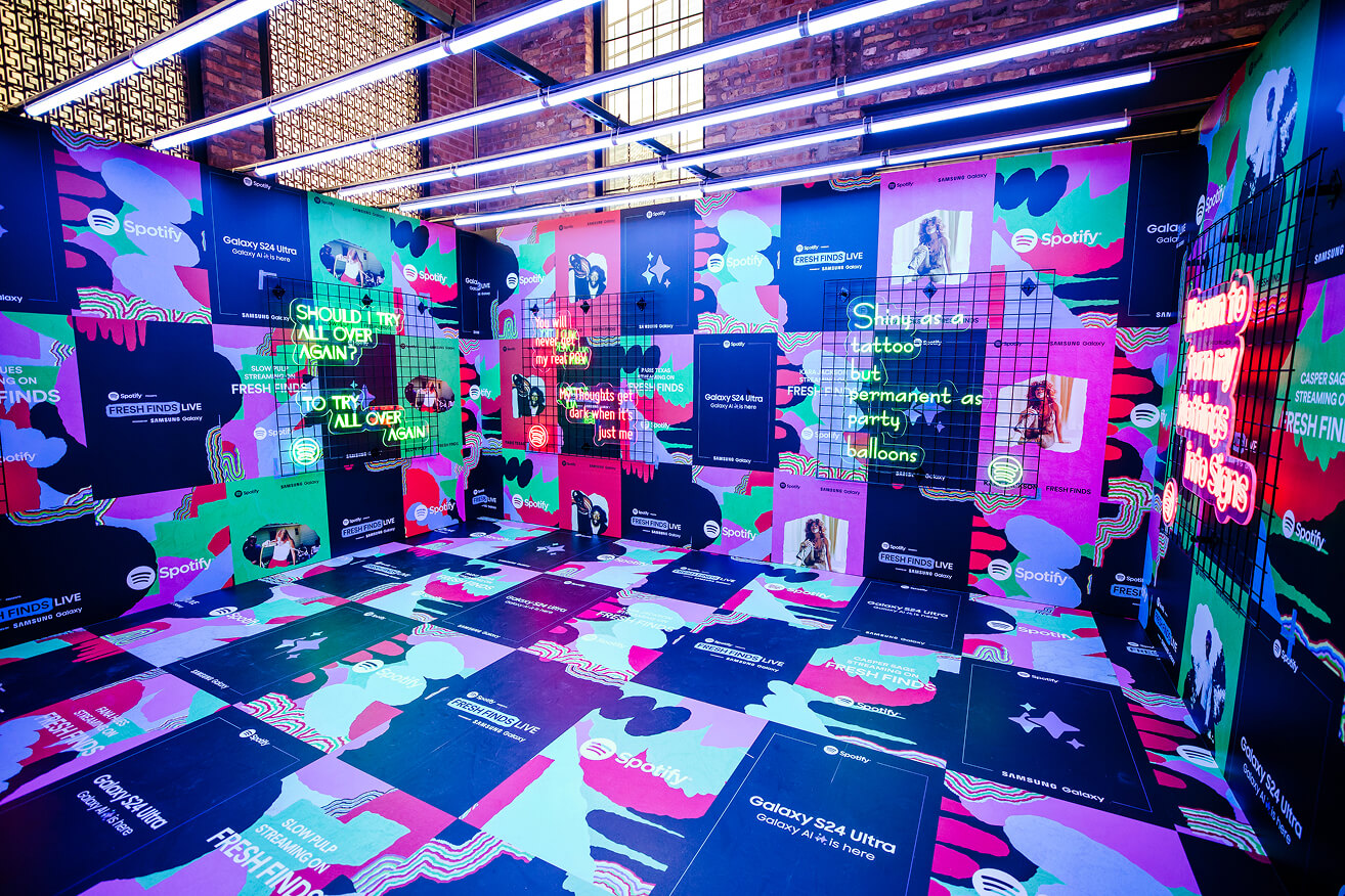 Spotify Fresh Finds and Samsung Galaxy immersive room with graphic-wrapped walls, floor and neon signs