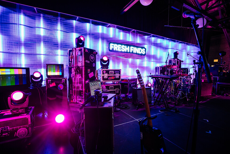 Fresh Finds stage set with drum kit, road cases and pixel-light backdrop before the Spotify show