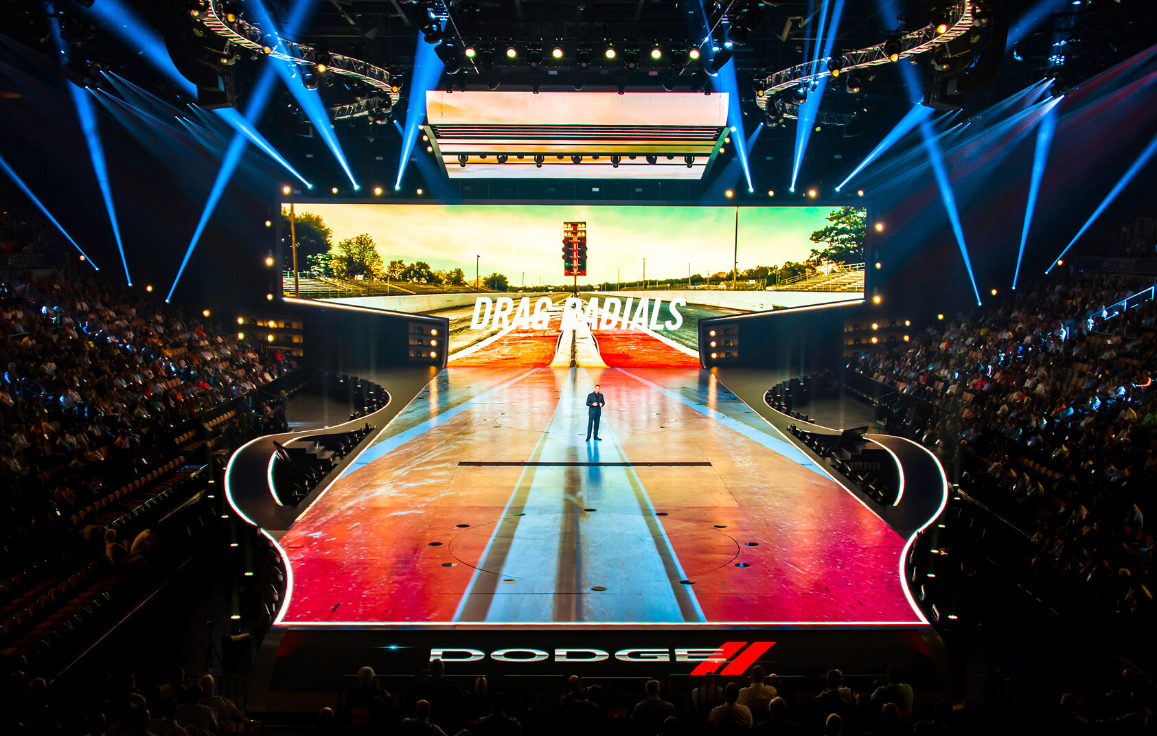 Dodge Drag Radials presentation on runway stage with LED racetrack visuals
