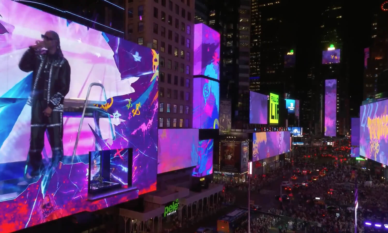 Snoop Dogg performing on a giant purple LED billboard above a packed Times Square at the Fortnite Chapter 2 Remix launch